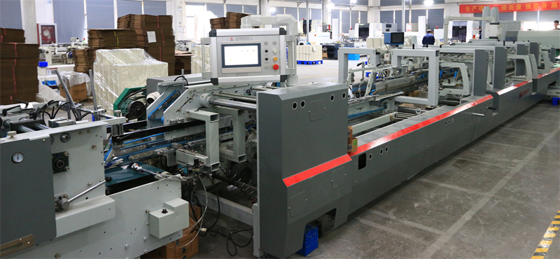 生產(chǎn)和檢驗一體的設備 上半部分需裁切 全自動糊盒品檢一體機 - 副本.JPG